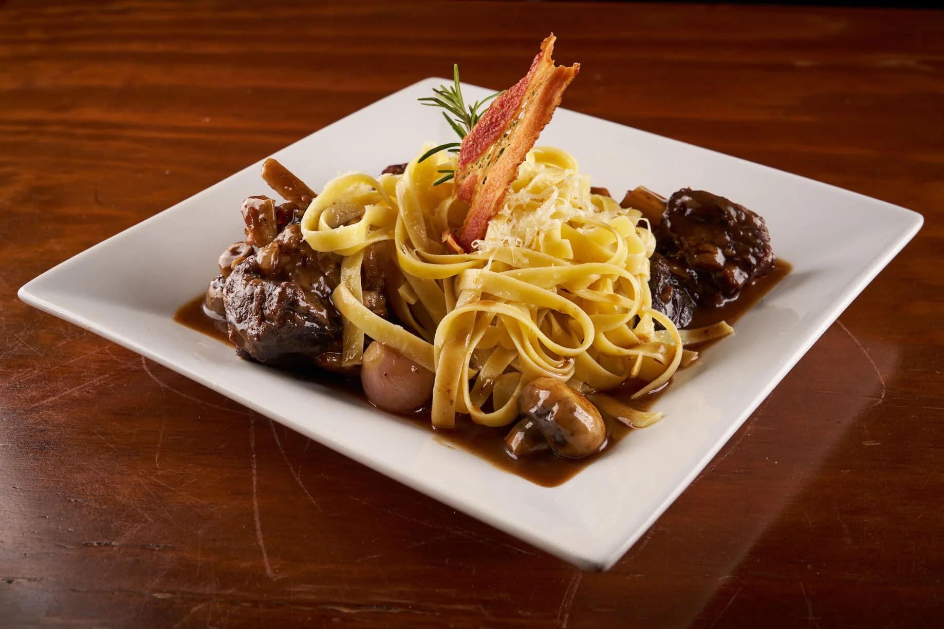 Asado de Tira con Fetuccini